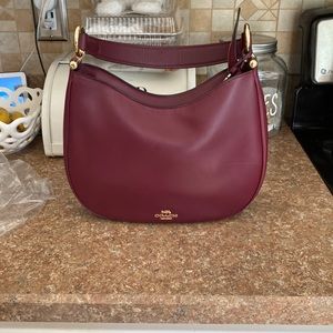 Plum Coach Purse